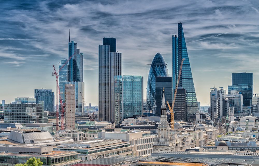 The modern London skyline, reflecting its enduring role as a global financial hub, a significant economic legacy of the British Empire.